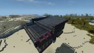 The water and signs placed into the iron farm's upper layers (Image via Minecraft)